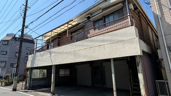 写真：旧所在地（川崎区東門前）の建物。現在は閉所しています。